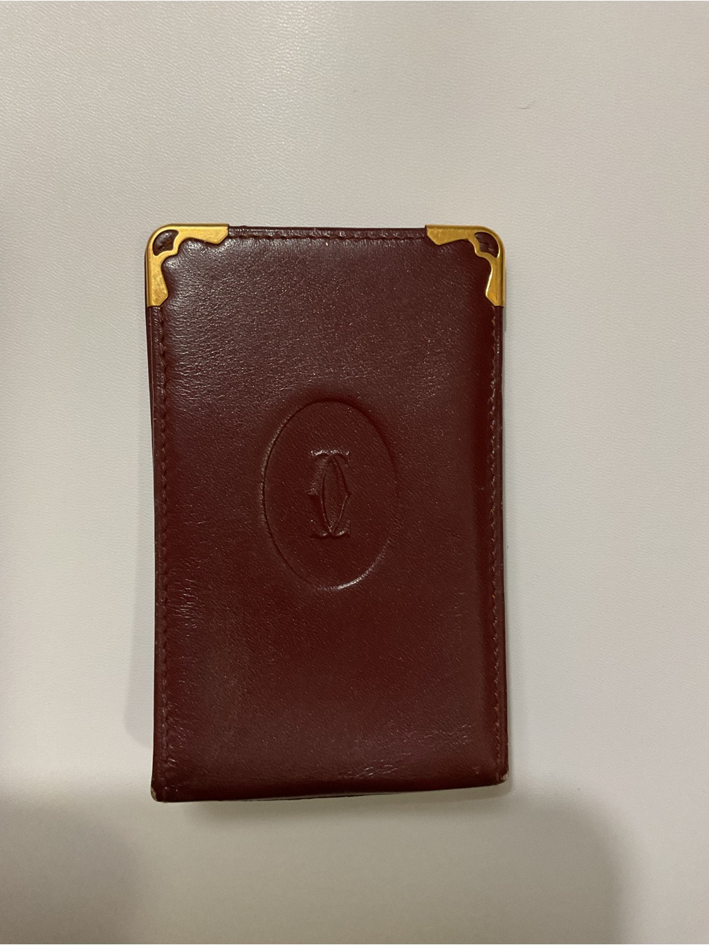 Unisex Authentic Cartier Burgundy Leather Phone Sleeve With Gold Corner Accents